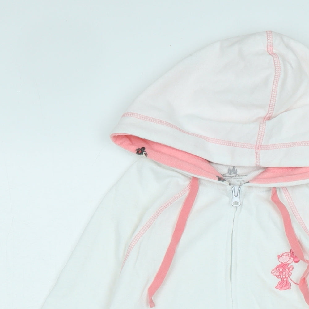 Close-up detail of Disney girls’ white jacket, size S, zip - logo