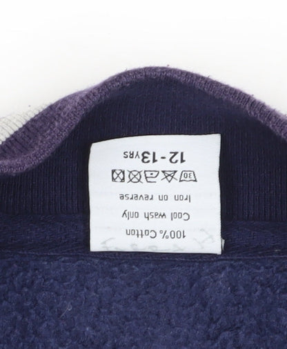 Brand and care label for Malcolm & Gerald boys’ blue varsity jacket 12-13 years