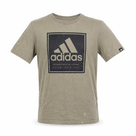 Front view of adidas boys’ green t-shirt, 13-14 years, logo graphic, casual wear