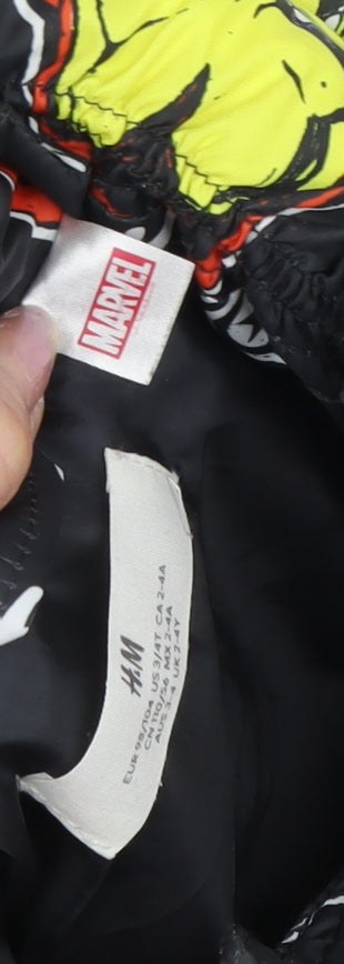 Back view of Marvel boys’ black puffer jacket 10-11 years superhero print