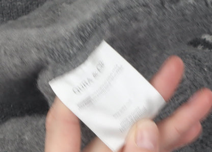 Brand and care label for Quba & Co Grey Wool Fair Isle jumper XL