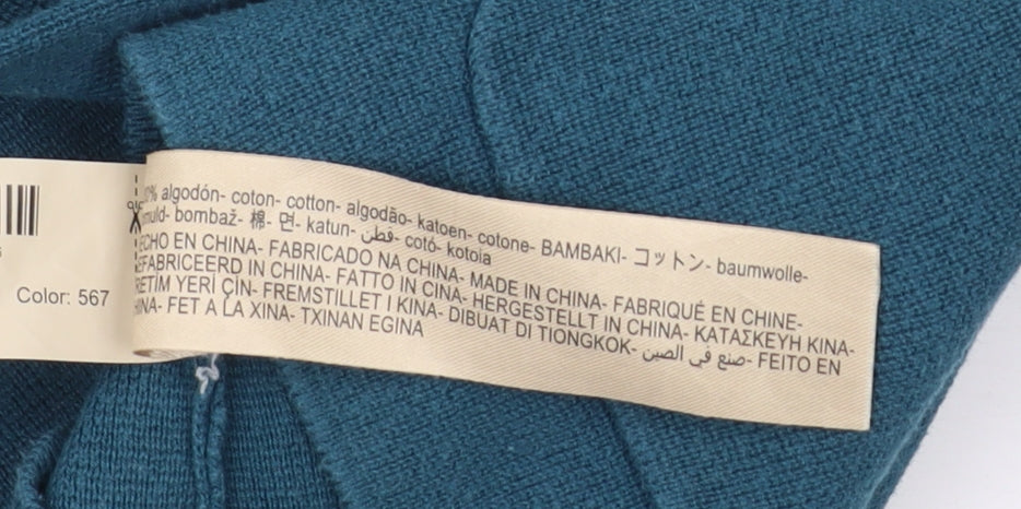Brand and care label for Massimo Dutti girls’ blue pullover blouse, age 9-10, classic