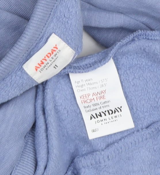 Close-up detail of John Lewis girls’ blue pullover sweatshirt -, size 11, years