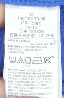 Brand and care label for Gap boys’ blue logo pullover hoodie, size 12, years