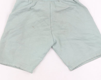 Brand and care label for Adidas boys’ green sweat shorts, size 9-10, drawstring pockets