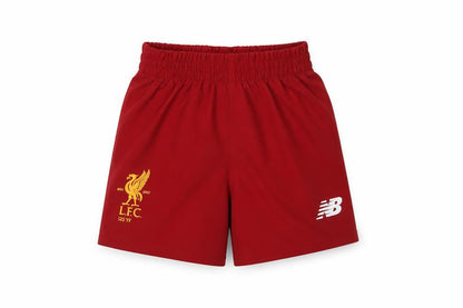 Front view of New Balance unisex baby red shorts 3-6 months polyester