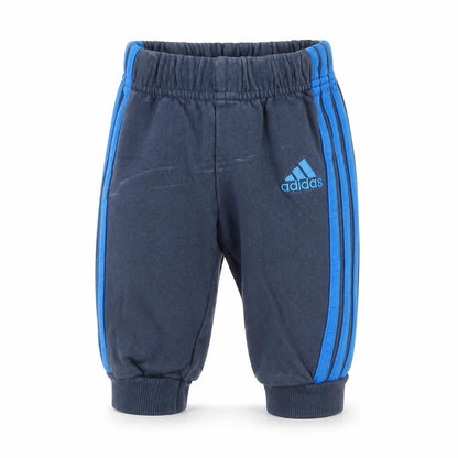 Front view of Adidas unisex baby blue jogger trousers 0-3m - cotton comfort
