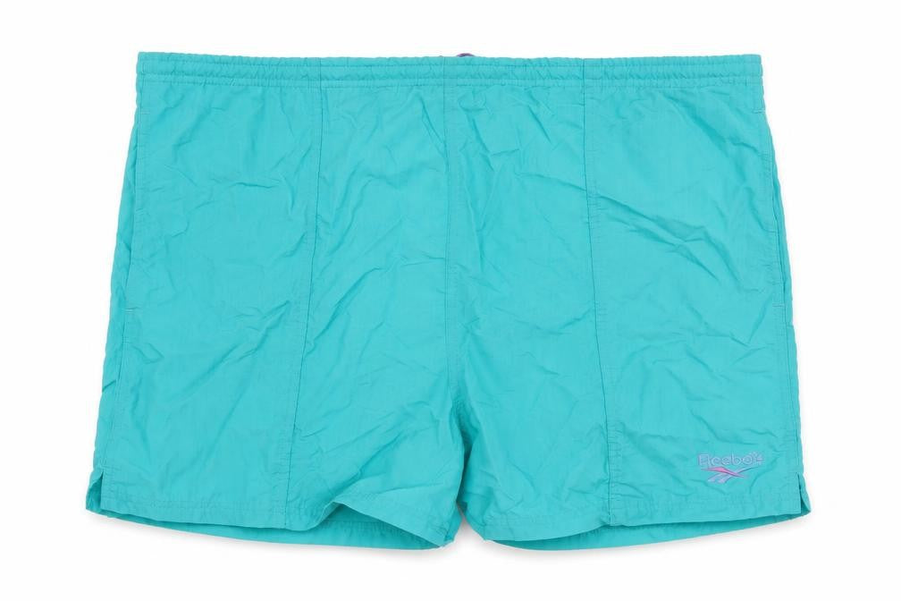 Front view of Reebok Men's Blue XL Swim Shorts with Mesh Lining