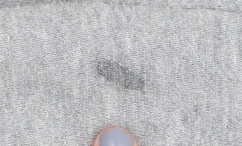 Close-up detail of Converse boys’ grey sweatshirt 12-13 years graphic print pullover