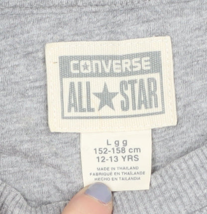 Brand and care label for Converse boys’ grey sweatshirt 12-13 years graphic print pullover