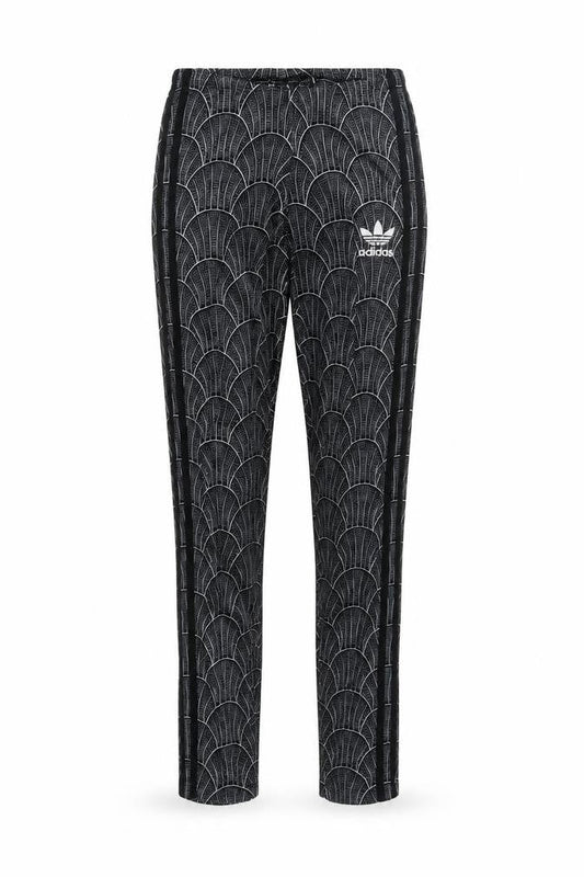 Front view of Adidas Women's XS Black Track Pants with Geometric Pattern