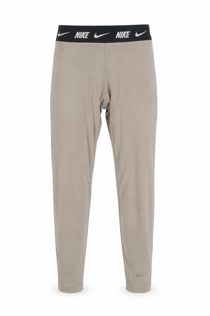 Front view of Nike unisex grey compression leggings m - gym training fit