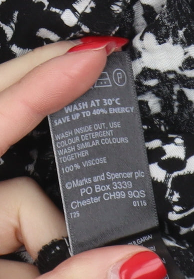 Marks and Spencer Women's Black Geometric Jumpsuit Size 8