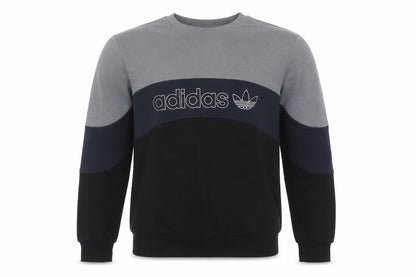 Front view of Adidas boys’ black grey colourblock sweatshirt 13-14 years