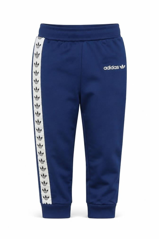 Front view of Adidas boys’ blue track pants 3 years regular fit
