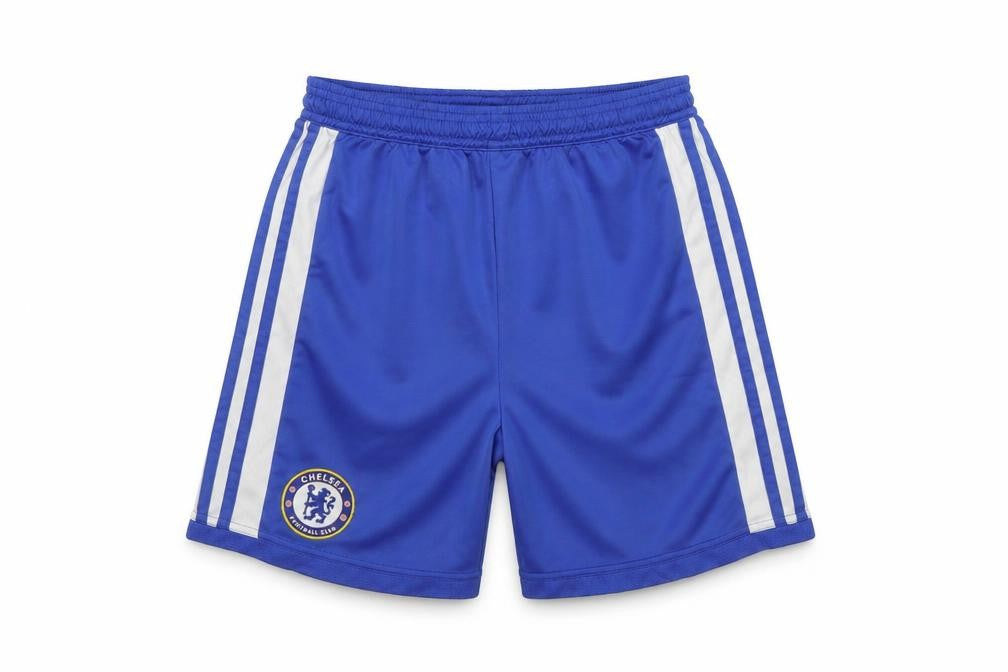 Front view of Adidas boys’ blue athletic shorts with elastic waist