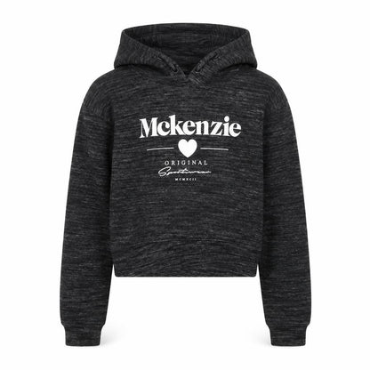 Front view of McKenzie girls’ black pullover hoodie 8-10 years