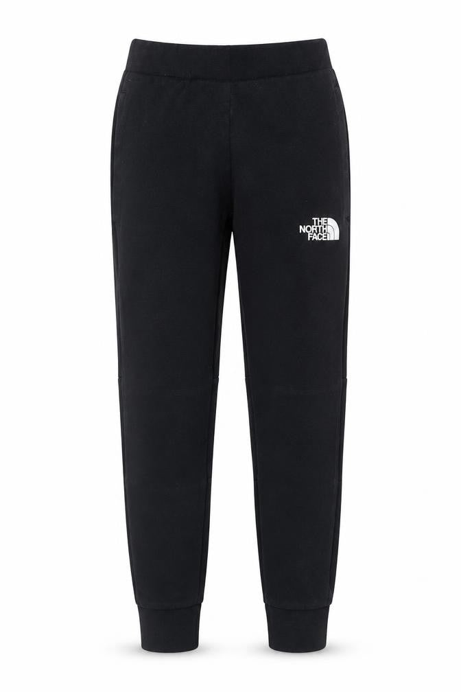 Front view of The North Face unisex kids black m jogger trousers