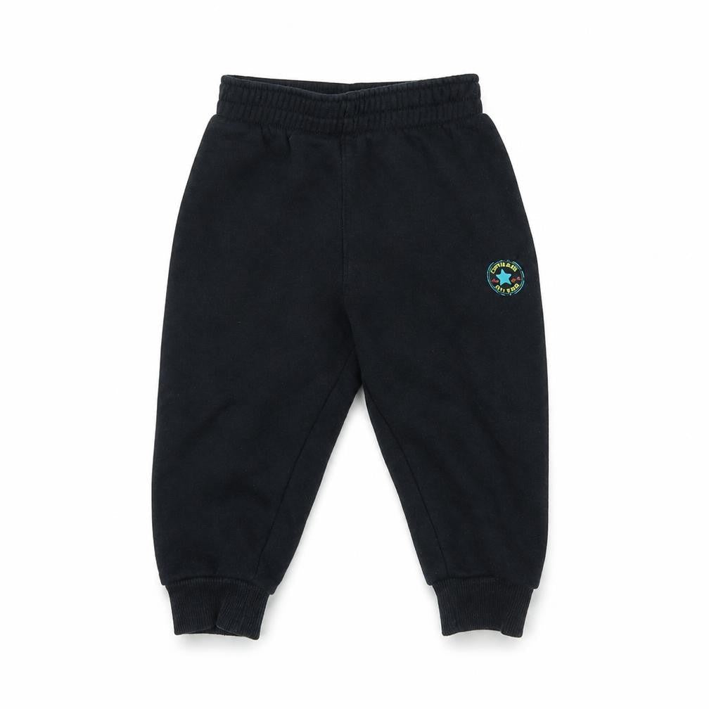 Front view of Converse unisex black jogger trousers 18 months