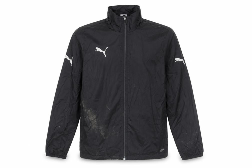 Front view of Puma boys’ black basic jacket, 14 years, logo accents