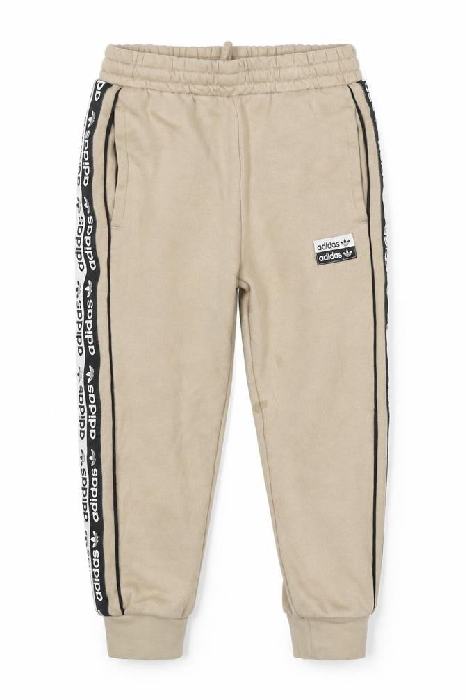 Front view of Adidas boys’ beige jogger trousers 4-5 years