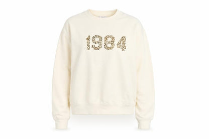 Front view of Rock On Ruby Ivory unisex sweatshirt s
