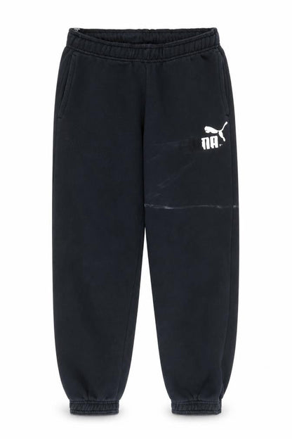 Front view of Puma boys’ black jogger trousers, regular fit, size 12