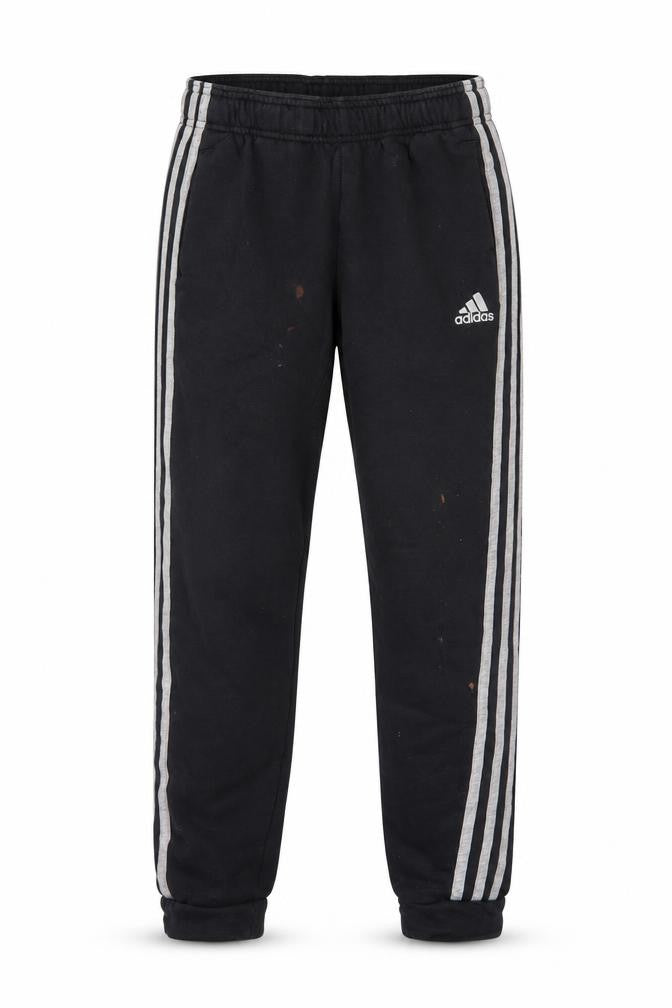 Front view of Adidas boys’ black jogger trousers, size 12, years
