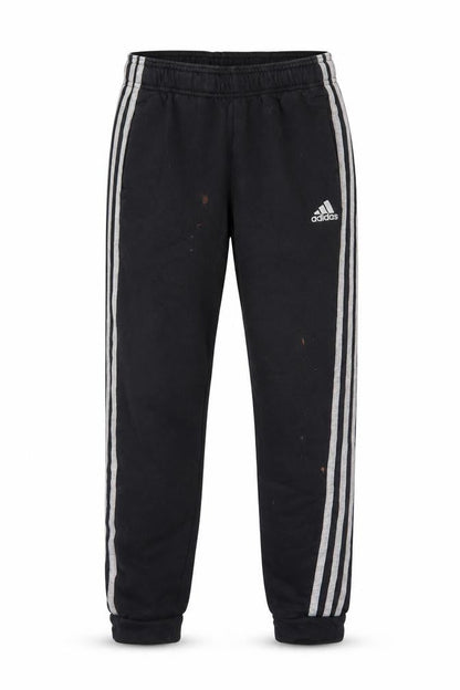 Front view of Adidas boys’ black jogger trousers, size 12, years