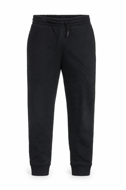 Front view of Converse boys’ black jogger trousers, size S, elastic waist