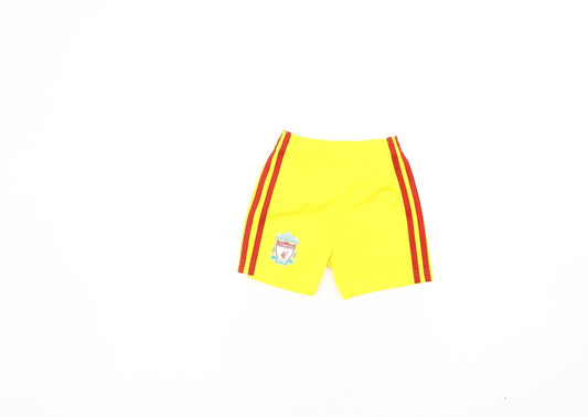 Front view of Adidas boys’ yellow athletic football shorts, size 12
