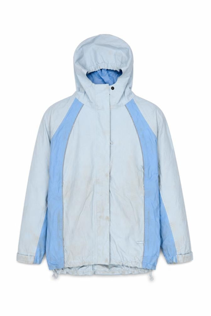 Front view of Peter Storm girls’ blue mid-length waterproof jacket