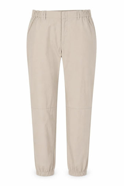 Front view of Cuts unisex beige tapered trousers l polyester