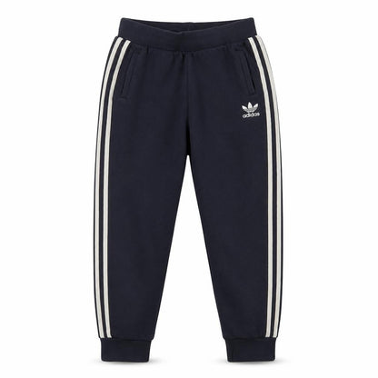 Front view of Adidas boys’ blue jogger trousers 10 years