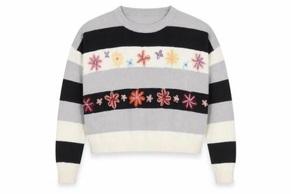 Front view of Girl with the Golden Locket Women's Grey Floral Jumper, size M