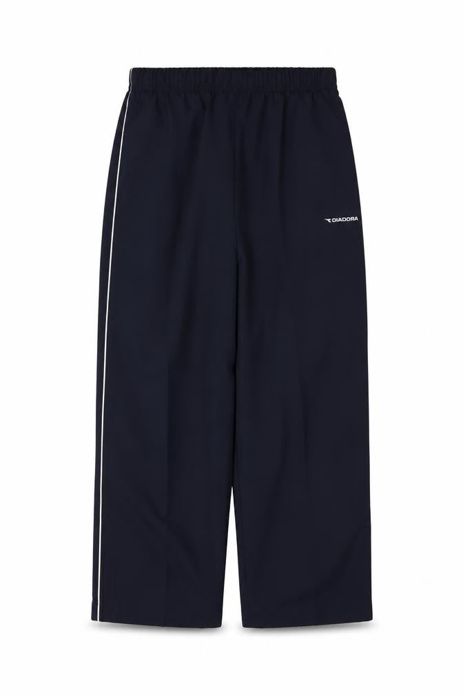 Front view of Diadora boys’ blue jogger trousers, size 12, years