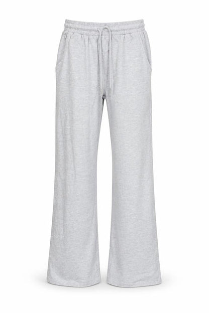 Front view of PRETTYLITTLETHING Women’s Grey Track Pants, size UK 4