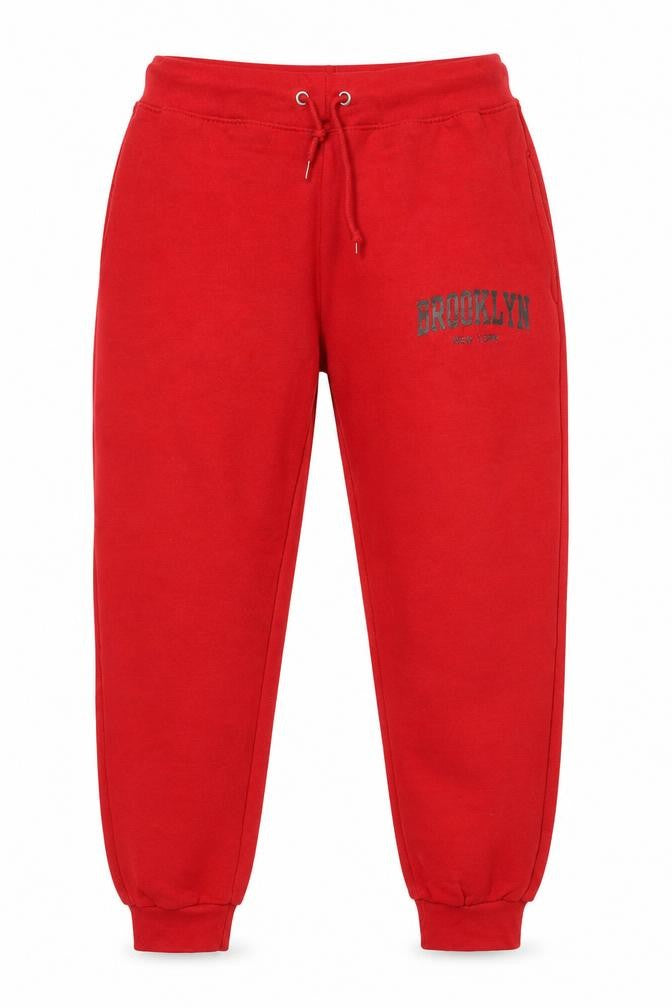 Front view of North West Red Jogger Trousers L unisex with logo