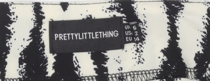 PrettyLittleThing Women’s Black Animal Print Mini Skirt Size 6