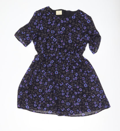 Pins and Needles Women’s Black Skater Dress M Short Sleeve Animal Print