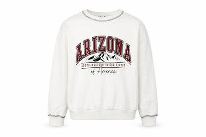 Front view of New Look girls’ white arizona sweatshirt age 12-13 graphic pullover