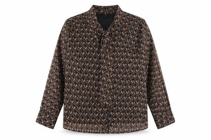 Front view of JD Williams women’s brown geometric blouse, size UK 20, collared long sleeve