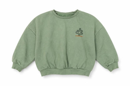 Front view of Dunnes girls’ green pullover sweatshirt 4-5 years nature print