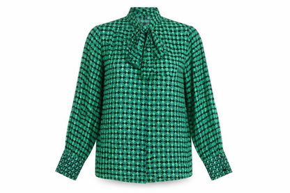 Front view of Dunnes women’s green geometric bow neck long sleeve blouse m