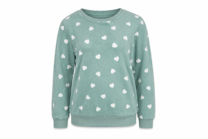 Front view of Dunnes women’s green xs fleece heart print jumper