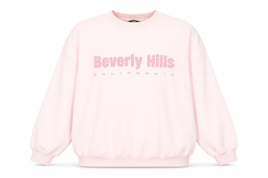 Front view of Dunnes women’s pink beverly hills sweatshirt l casual