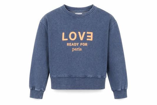 Front view of Zara girls’ blue love paris graphic pullover sweatshirt 11-12 years
