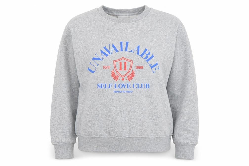 Front view of Dunnes women’s grey marl small graphic pullover sweatshirt