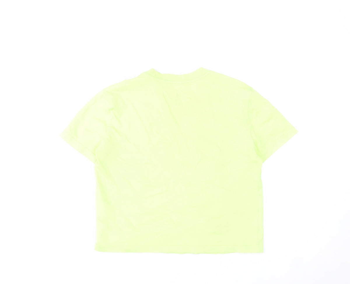 Close-up detail of Adidas women’s xs green cropped t-shirt short sleeve sports top