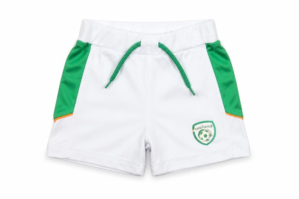 Front view of Dunnes unisex baby white green football shorts 12-18 months polyester